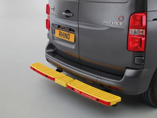 yellow AccessStep triple on van rear