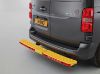 yellow AccessStep triple on van rear