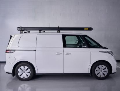 Black Maxi pipe carrier fitted to a white van side view