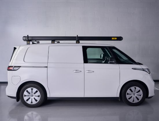 Black Maxi pipe carrier fitted to a white van side view