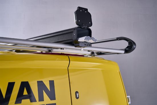 Black Maxi pipe carrier on a roof rack rear view