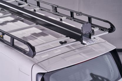 Black Maxi pipe carrier on a roof rack with end cap open
