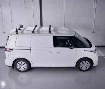 Black ULTI Bar roof bars fitted to a white van side view