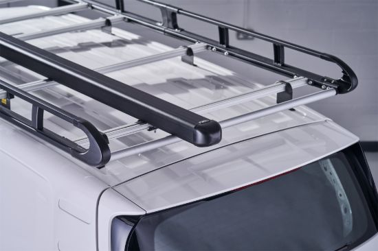 Black Standard pipe carrier mounted on a roof rack
