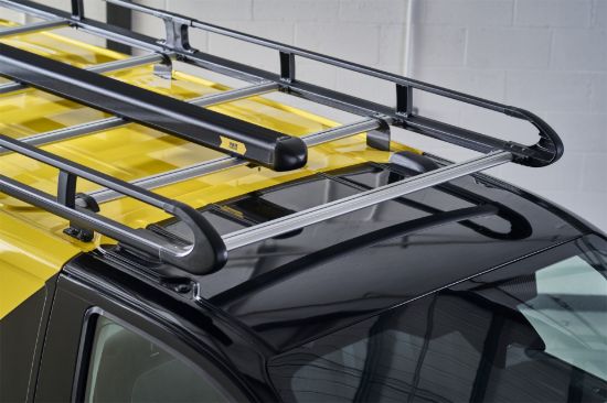 Black Standard pipe carrier on a roof rack fitted to a black van